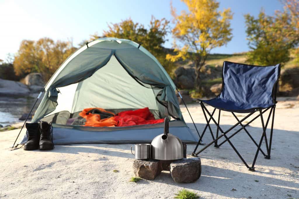 tent and gear set up for a comfortable camping trip