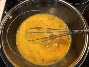 12 eggs whisked with spices