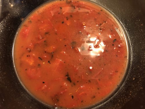 tomatoes and seasonings in a bowl