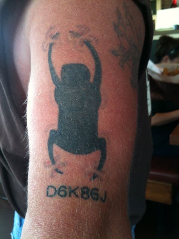 geoscarab tattoo on man's arm
