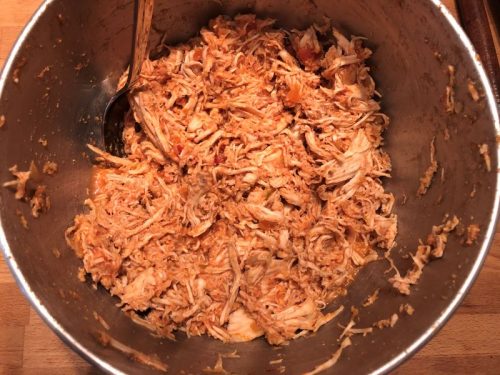 chicken cooked in salsa, then shredded in a mixer